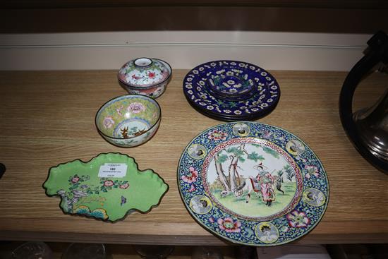 A Chinese Canton enamel brushwasher, two bowls and cover, four plates and three stands, 19th/20th century